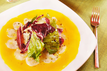 Carpaccio made of scallops
