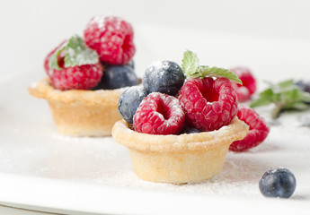 Fruits cake and fresh berries