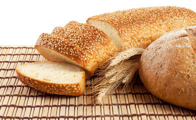 Fresh bread on a straw mat