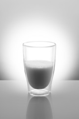 Glass of milk in black and white
