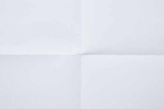 White Sheet Of Paper Folded In Four