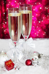 champagne glasses and christmas decoration