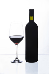 wine glass and a bottle, white background