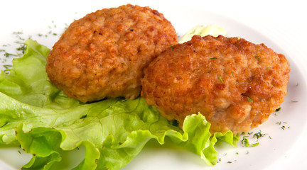 cutlets and salad on a plate