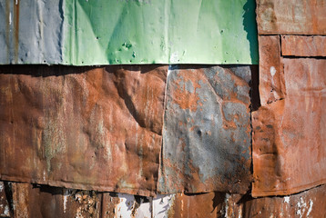 Old rusted sheet metal wall texture