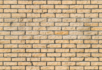 Small-scale yellow brick wall
