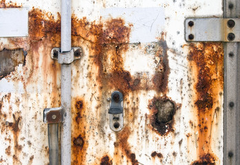 Old rusted cargo container door closeup texture