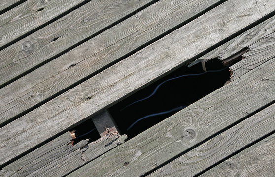 Wooden Pier Floor With Break Hole