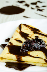 Delicious pancake covered with chocolate