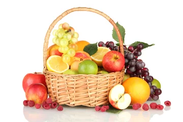 Wandaufkleber Assortment of exotic fruits in basket, isolated on white © Africa Studio