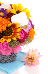 Beautiful bouquet of bright flowers with paper note isolated