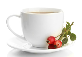 cup of tea with hip roses, isolated on white