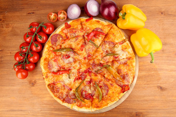 Tasty pepperoni pizza with vegetables