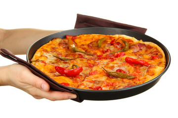 hands holding pepperoni pizza in pan isolated on white