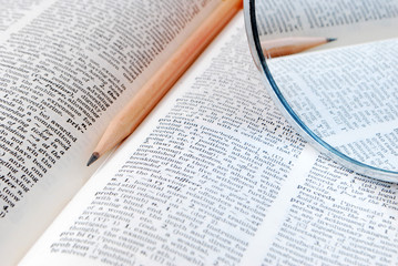 Page of book for reading with pencil