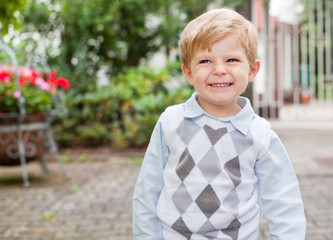 Adorable toddler on way to  kindergarten