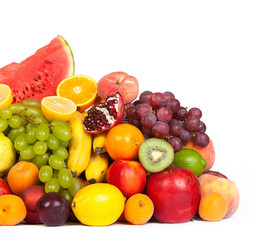 Huge group of fresh fruits isolated on a white