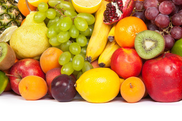 Huge group of fresh fruits isolated on a white