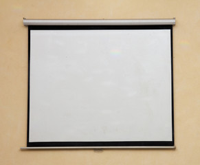 white screen on the wall as background