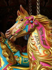 The Colourful Head of a Fun Fair Carousel Horse. © daseaford