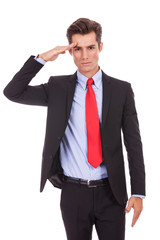 Business man gives military salute