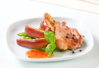Pan fried pork and apple slices