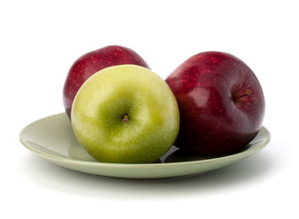 Apples pile on plate