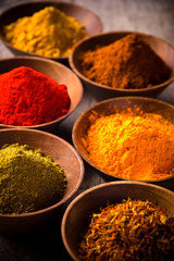 Assorted spices in wood boxes