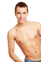 Fototapeta premium Strong man with a helathy body isolated over white background