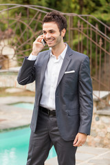 Young Businessman  with Mobile Phone