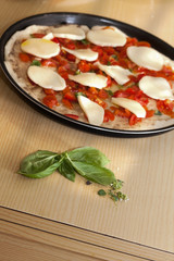 Pizza with basil