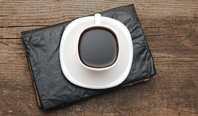 cup of coffee and old books