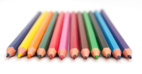colorful pencils on white background