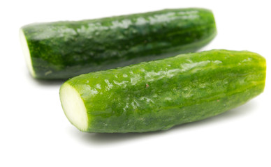 salted cucumber on white background