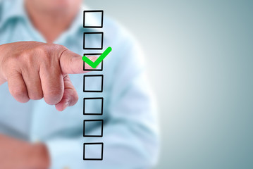 business man designed on a checklist box