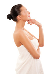 Portrait of Fresh and Beautiful brunette woman wearing white tow