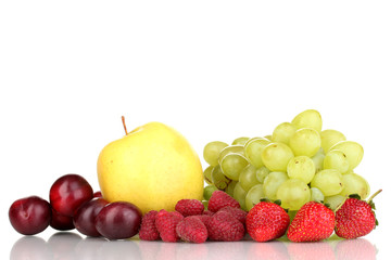 Mix of ripe sweet fruits and berries isolated on white
