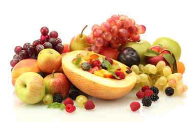 fresh fruits salad in melon, fruits and berries, isolated