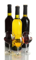 bottles and glasses of wine isolated on white