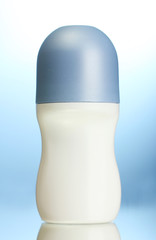 deodorant on blue background