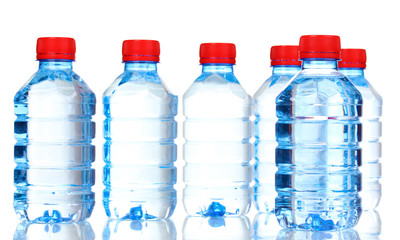plastic bottles of water isolated on white