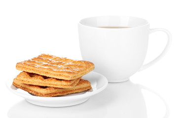 Obraz na płótnie Canvas Cup of tea and cookies isolated on white