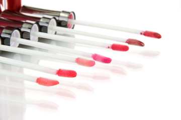 beautiful lip glosses, isolated on white
