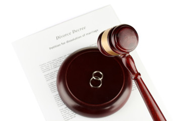 Divorce decree and wooden gavel on white background