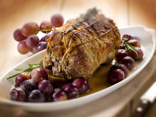 meat roasted with grape, selective focus
