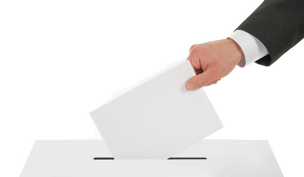 Man Hand Down The Ballot In The Ballot Box