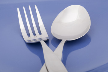 close up image of spoon and fork