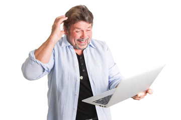 &Auml;lterer Herr freut sich - Computer in der Hand