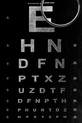 eye test chart and magnifying glass