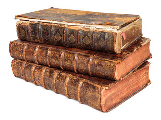 Three seventeenth century antique books isolated on white